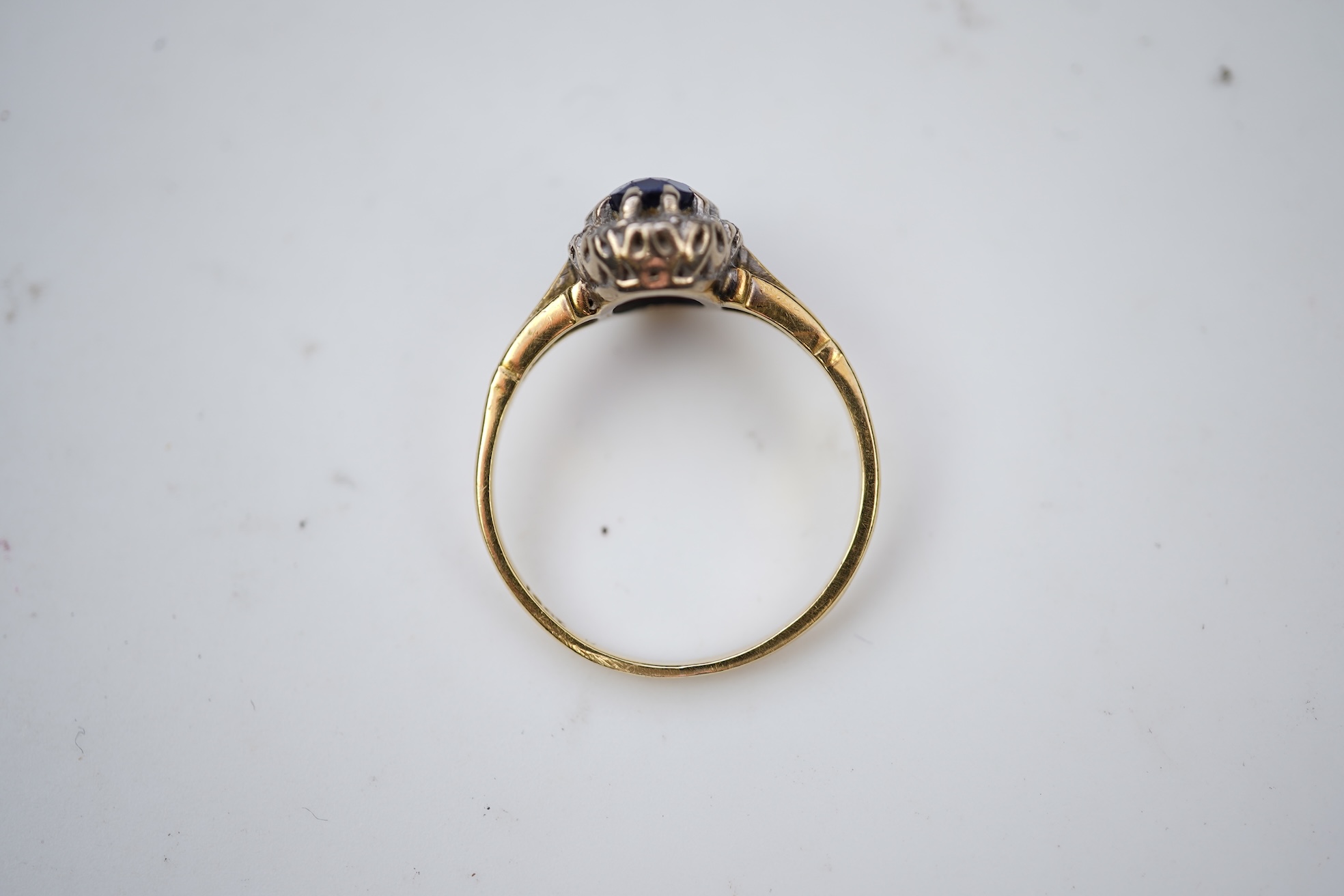 A synthetic sapphire and diamond cluster ring, mid 20th century